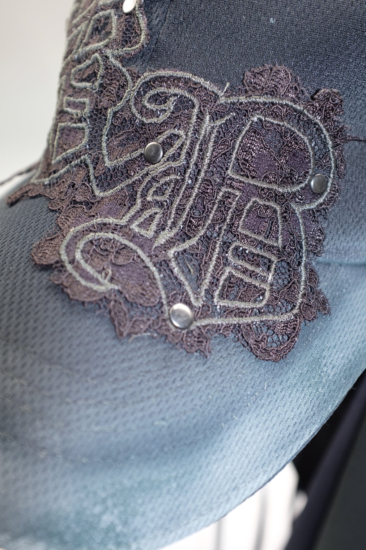 Broken lace patch utility cap