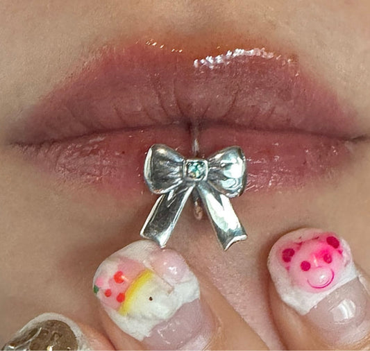 Cubic ribbon lip and ear cuff